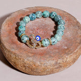 Turquoise Beads Om Rakhi
