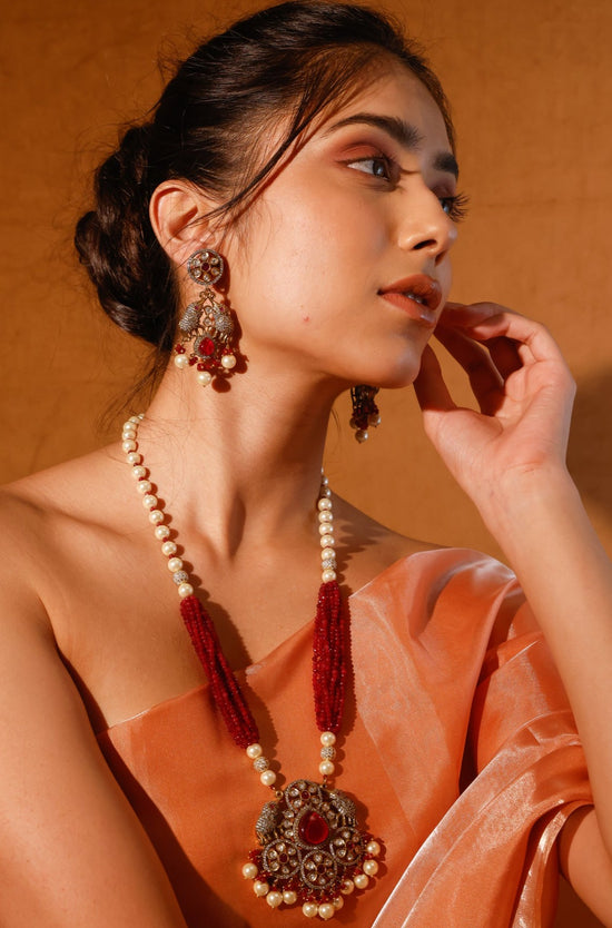 The Elephant Long Necklace Set With Pearls And Red Onyx